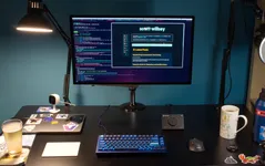 My computer desk with MacBook Pro and Apple Studio Display